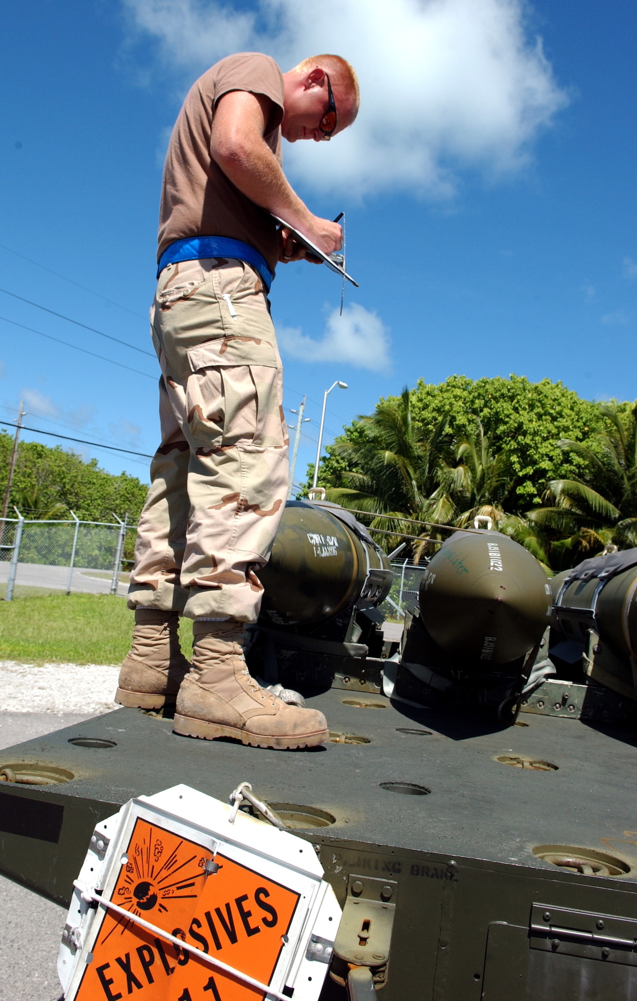Airman 1st Class Singley Harrell inspects a 2,000-pound bomb before doing a tear down and rebuild of the bomb at a base supporting Operating Enduring Freedom on Wednesday, May 17, 2006. The Airman, of the 40th Air Expeditionary Group, deployed here from Barksdale Air Force Base. (U.S. Air Force photo/Staff Sgt. Patrick Mitchell) 
