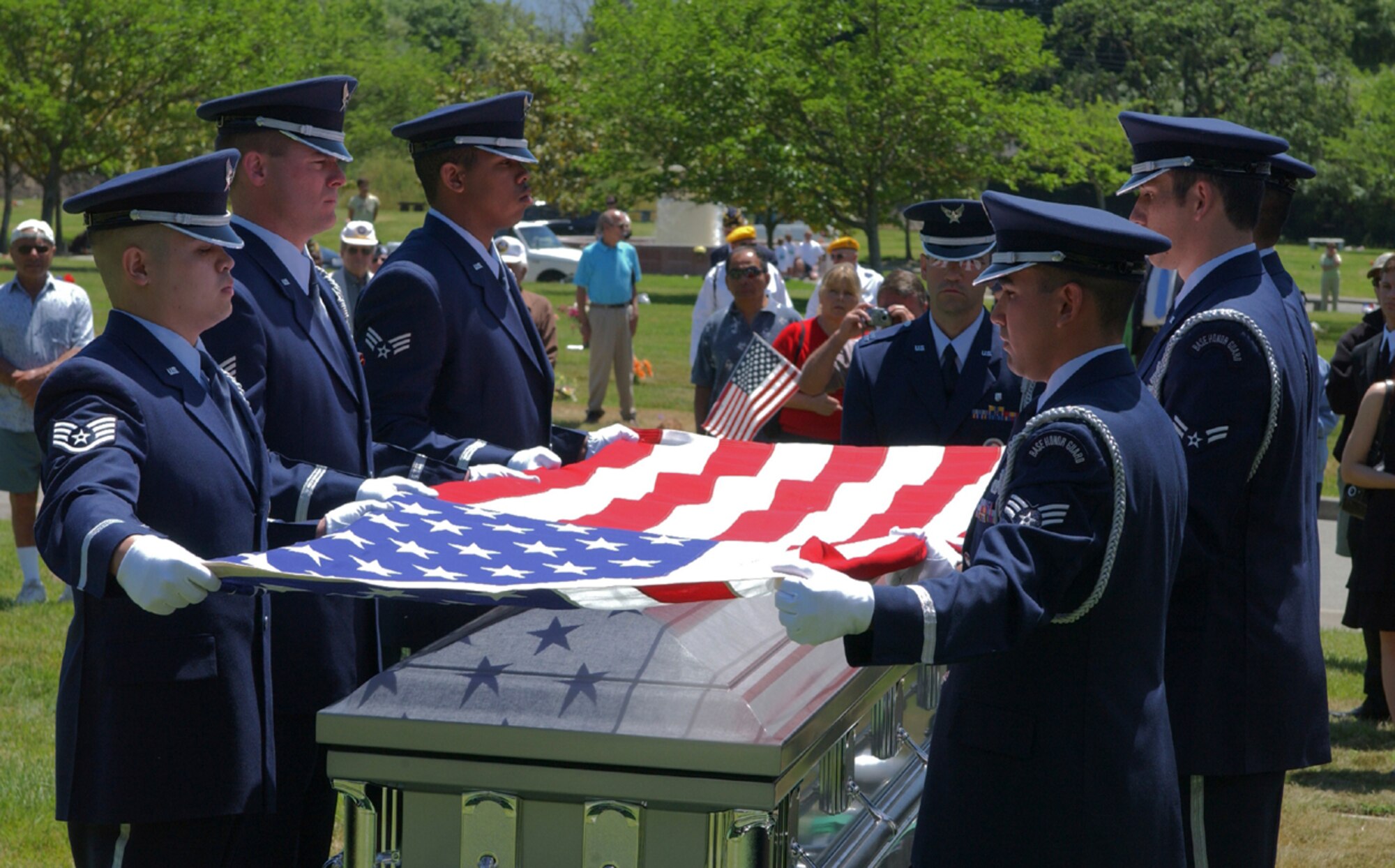 The remains of 1st Lt. Alvin Crane Jr. were laid to rest at Santa Rosa Memorial Park Saturday nearly 55 years after being shot down during a reconnaissance mission outside Uijonbu, Korea. Lieutenant Crane’s remains were repatriated from Korea more than 15 years ago.  His remains stayed at Hickam Air Force Base, Hawaii, before being positively identified by DNA testing. Although his remains have been identified, the circumstances of his death remain a mystery. Other members of his squadron saw Lieutenant Crane parachute safely to the ground and run into the nearby woods. His remains showed no signs of foul play. (U.S. Air Force photo by Andre Mansour)