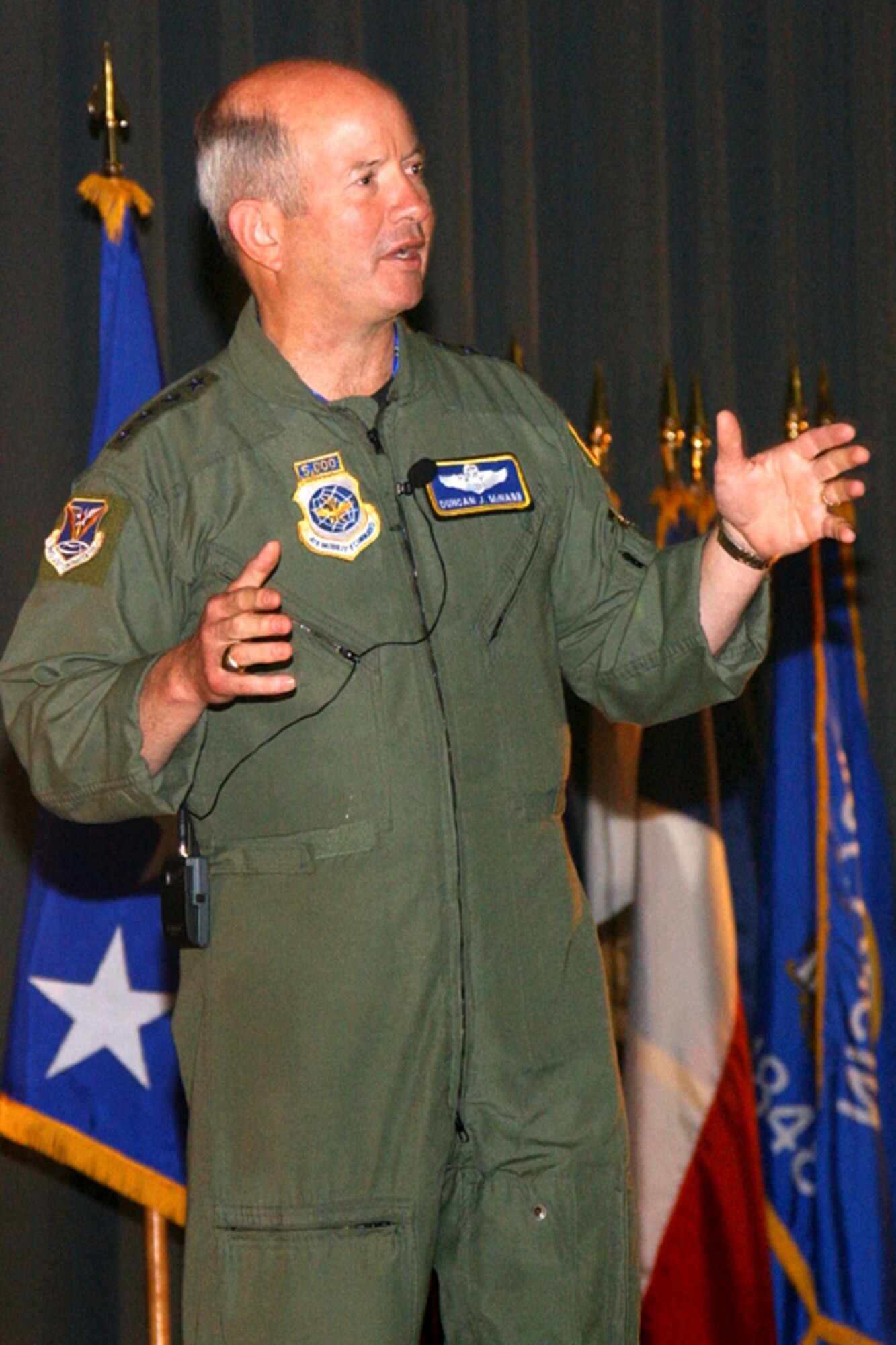 Gen. Duncan J. McNabb, Air Mobility Command commander, speaks to Airmen during the commander’s call May 12. General McNabb, his wife, Linda, and the new AMC command chief, Chief Master Sgt. Joseph Barron, received a two-day tour of Travis. (U.S. Air Force photo by Nan Wylie)

