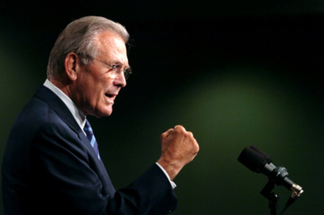 Secretary of Defense Donald H. Rumsfeld addresses Pentagon civilian employees and service members during a town hall meeting on May 19, 2006. Rumsfeld and Chairman of the Joint Chiefs of Staff Gen. Peter Pace, U.S. Marine Corps, answered questions and thanked the audience for their hard work and devotion. 