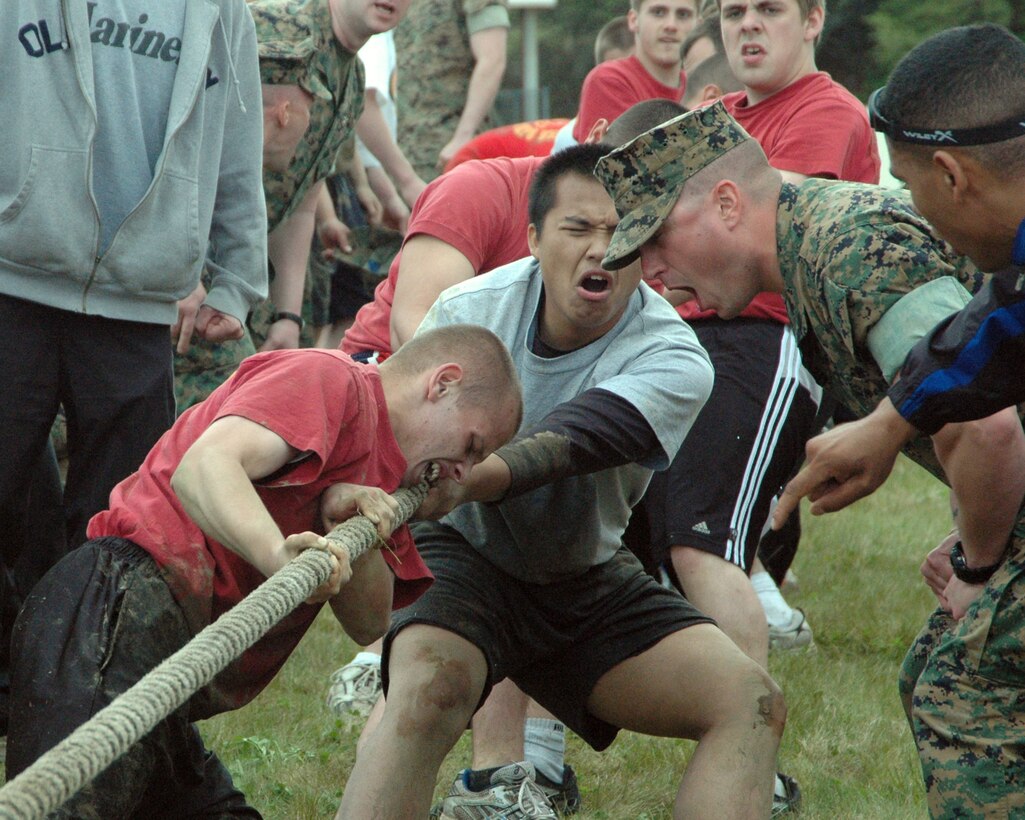 Staff Sgt. Joshua Langdon, staff noncommissioned officer-in-charge of Recruiting Substation Dover, N.H., motivates his tug-o-war team during the RS Portsmouth annual field meet May 20 at the Portsmouth Naval Shipyard. Approximately 450 poolees and their guests attended the event designed to instill camaraderie and esprit de corps as well as ensure the RS summer pool was ready to ship to recruit training.