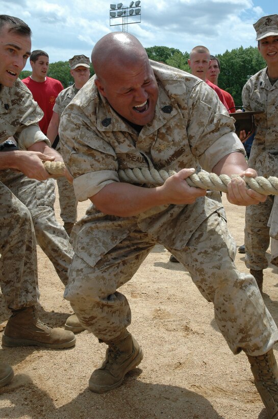 Gunnery Sgt. Michael J. Rheault, a recruiter with Recruiting Substation Patchogue, pulls his weight and more during the tug-of-war competition at the Recruiting Station New York Sergeant Major's Cup May 20.  RSS Patchogue went on to win the competition.  As a reward, they were wisked away in a helicopter for an arial tour over the Long Island Sound.