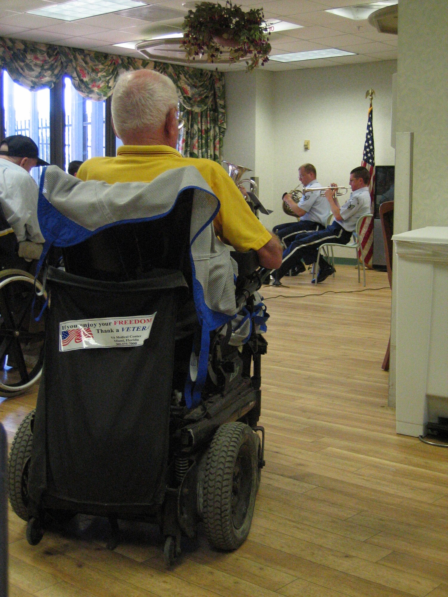 Residents of the Miami, Fla Veterans Administration Retirement Facility spent part of Armed Forces Day afternoon enjoying patriotic music played by the Air Force Reserve Band's Brass Quintet ensemble. Some of the residents took time to have a photo taken with the band. The Band of the Air Force Reserve performed nine times in South Florida as part of a community outreach project.
(Air Force photo by Tech. Sgt. Paul Dean)
