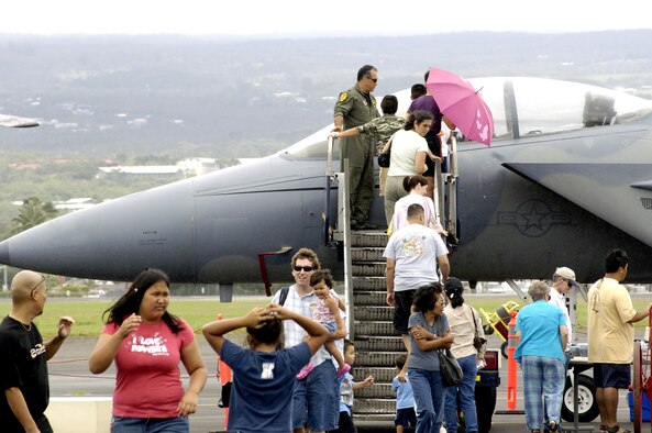 Visitors line up to view the cockpit of an F-15E Strike Eagle on Saturday, May 20, 2006, during an Armed Forces Day air show at Hilo International Airport, Hawaii.  The Hawaii Air National Guard hosted the show to give the public a chance to view various aircraft stationed in Hawaii and to generate public interest in the military. (U.S. Air Force photo/Tech. Sgt. Shane A. Cuomo)