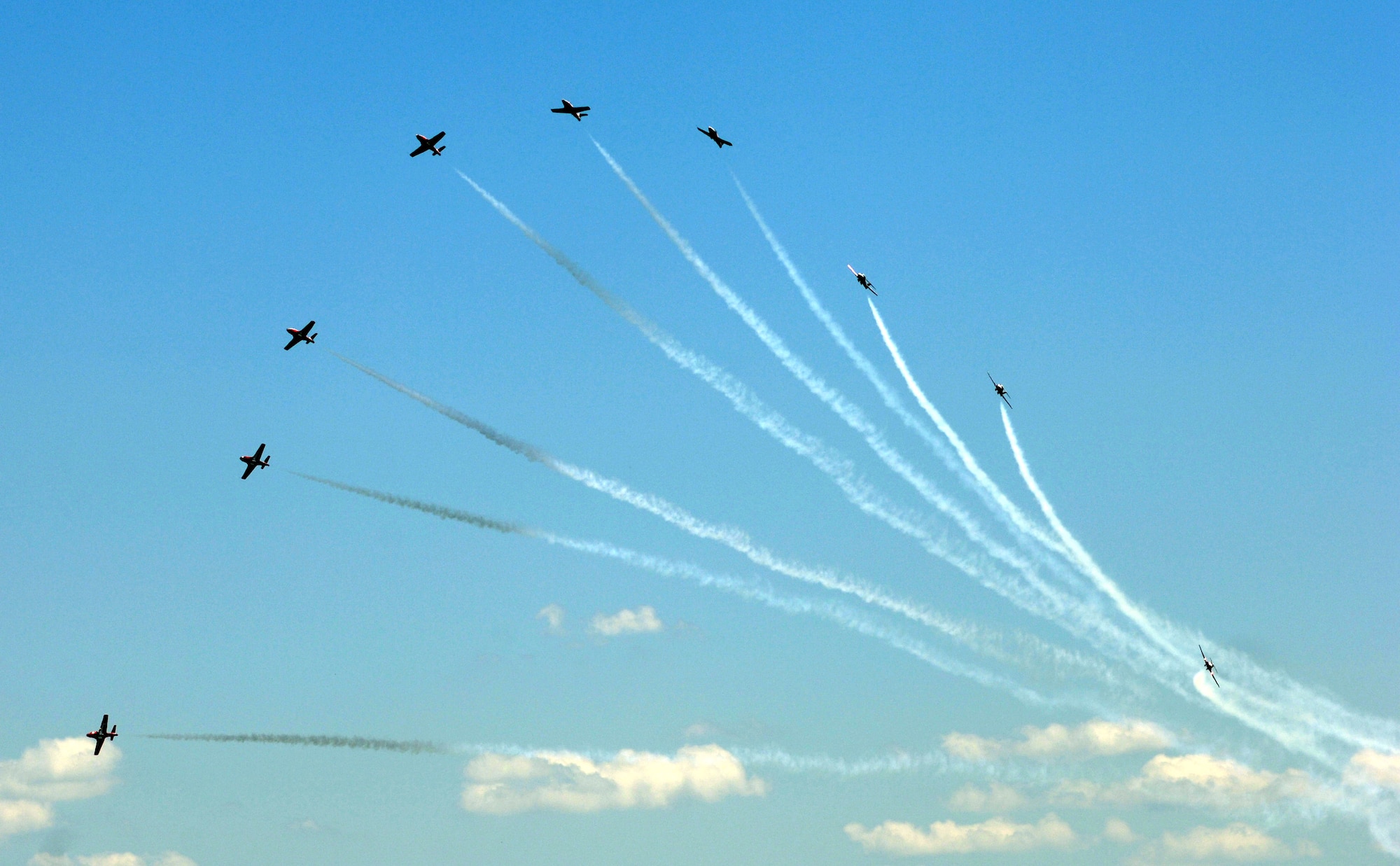 The Canadian Air Force's 431st Air Demonstration Squadron performs during the 56th annual Department of Defense 2006 Joint Service Open House at Andrews Air Force Base, Md., on Saturday, May 20, 2006.  The three-day event highlighted American aviators, aircraft and technology.  (U.S. Air Force photo/Staff Sgt. Jason W. Edwards)