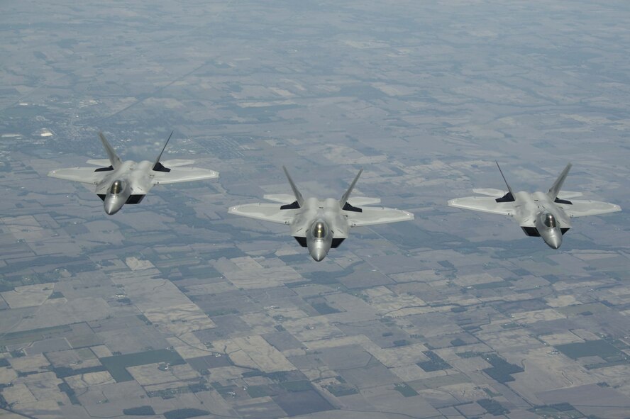 ELMENDORF AIR FORCE BASE, Alaska - F-22s from the 1st Fighter Wing stationed at Langley AFB, Va. fly to Elmendorf AFB Alaska on 23 May 2006.  The 7.5 hour transit was the longest continuous deployment of F-22s as 12 Raptors will participate in Exercise Northern Edge which is slated in June as a joint exercise under the control of Pacific Command. (Photo by Paul Weatherman)