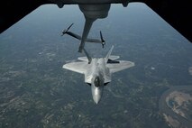 ELMENDORF AIR FORCE BASE, Alaska - F-22s from the 1st Fighter Wing stationed at Langley AFB, Va. fly to Elmendorf AFB Alaska on 23 May 2006.  The 7.5 hour transit was the longest continuous deployment of F-22s as 12 Raptors will participate in Exercise Northern Edge which is slated in June as a joint exercise under the control of Pacific Command. (Photo by Paul Weatherman)