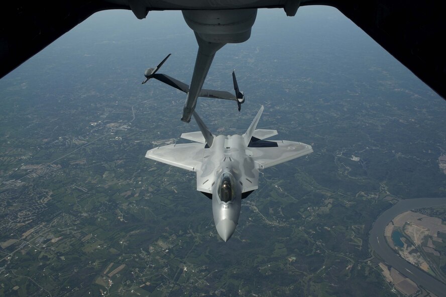 ELMENDORF AIR FORCE BASE, Alaska - F-22s from the 1st Fighter Wing stationed at Langley AFB, Va. fly to Elmendorf AFB Alaska on 23 May 2006.  The 7.5 hour transit was the longest continuous deployment of F-22s as 12 Raptors will participate in Exercise Northern Edge which is slated in June as a joint exercise under the control of Pacific Command. (Photo by Paul Weatherman)