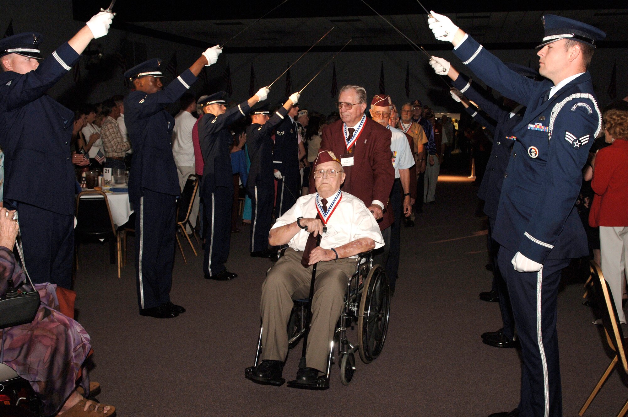 World War II Purple Heart recipient Wiley Smith is honored, along with other Purple Heart recipients, during the during the 2006 Former POW/Purple Heart Luncheon at Barksdale Air Force Base, La., on Saturday, May 20, 2006.  Lt. Gen. Kevin P. Chilton, 8th Air Force commander, was the keynote speaker. (U.S. Air Force photo/Master Sgt. Michael A. Kaplan) 