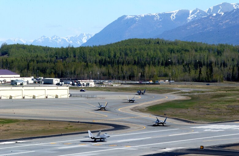 Five Air Force F-22 Raptors taxi after arrival at Elmendorf Air Force Base, Alaska, on Tuesday May 23, 2006. Raptors from the 27th Fighter Squadron at Langley AFB, Va., are supporting Exercise Northern Edge 2006. The Air Force has selected Elmendorf as the home for the next operational F-22 squadron. The base will receive 36 Raptors, with the first jet expected in fall 2007. (U.S. Air Force photo/Staff Sgt. Dave Donovan) 