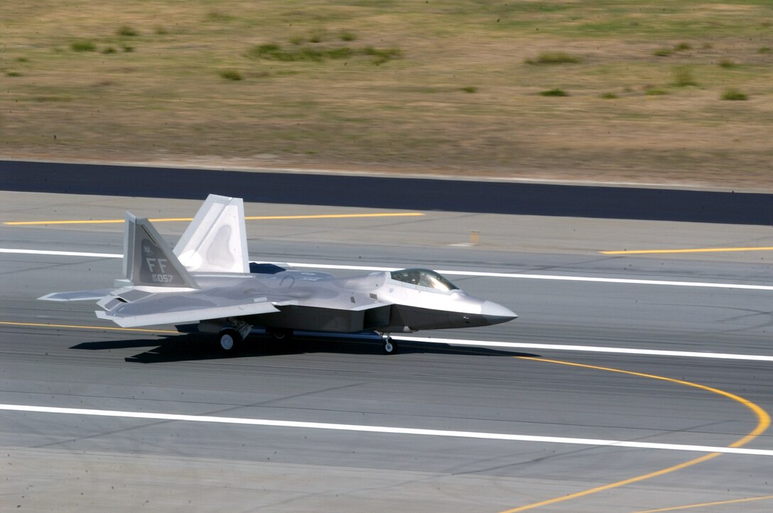 An F-22 Raptor taxis after landing at Elmendorf Air Force Base, Alaska, on Tuesday, May 23, 2006. Raptors from the 27th Fighter Squadron at Langley AFB, Va., are supporting Exercise Northern Edge 2006. The Air Force has selected Elmendorf as the home for the next operational F-22 squadron. The base will receive 36 Raptors, with the first jet expected in fall 2007. (U.S. Air Force photo/Staff Sgt. Dave Donovan) 
