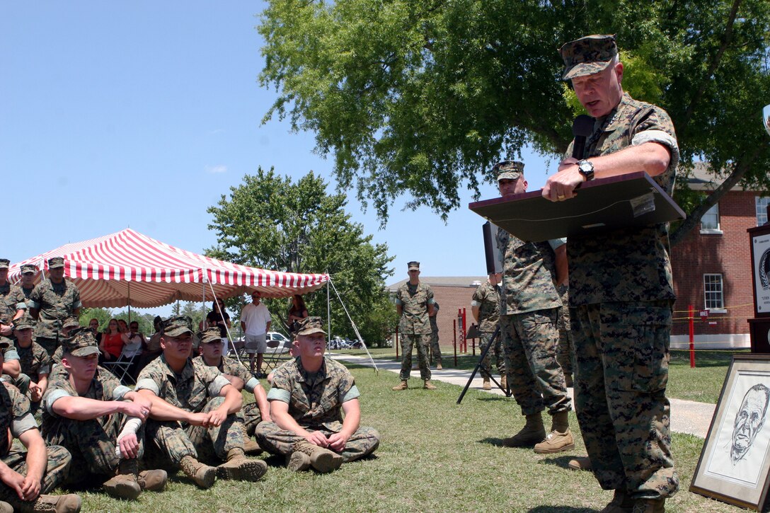 MARINE CORPS BASE CAMP LEJEUNE, N.C. - Commanding general of II Marine Expeditionary Force, Lt. Gen. James F. Amos, addresses Marines from 2nd Combat Engineer Battalion, 2nd Marine Division, as he presents the Lieutenant General "Chesty" Puller Outstanding Leadership Award May 23. The award, named after the legendary, highly-decorated Marine, emphasizes the high level of leadership, mission accomplishment, safety and force preservation by units under II MEF. The Marines from 2nd CEB received the medium unit award for the second time. (Marine Corps photo by Cpl. Ruben D. Maestre)