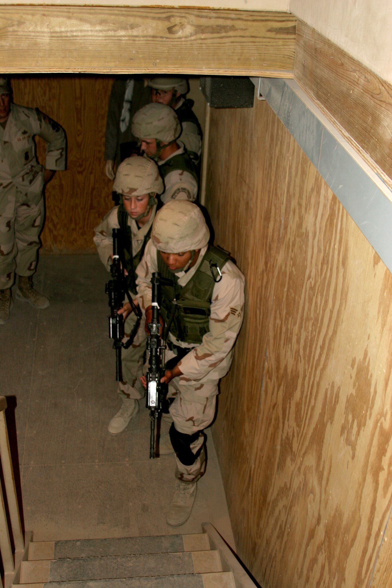 Teamwork is the key for Airmen participating in "military operations in urban terrain" training on Friday, May 19, 2006, in Southwest Asia. (U.S. Army photo) 
