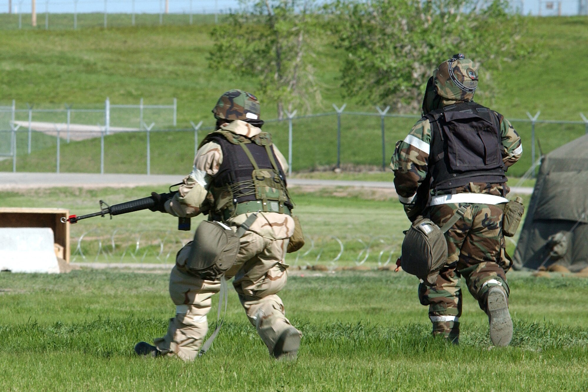 Airmen from the 28th Bomb Wing simulate a ground attack during an operational readiness exercise at Ellsworth Air Force Base, S.D., on Wednesday, May 24, 2006. (U.S. Air Force photo/Airman Anthony Sanchelli)
