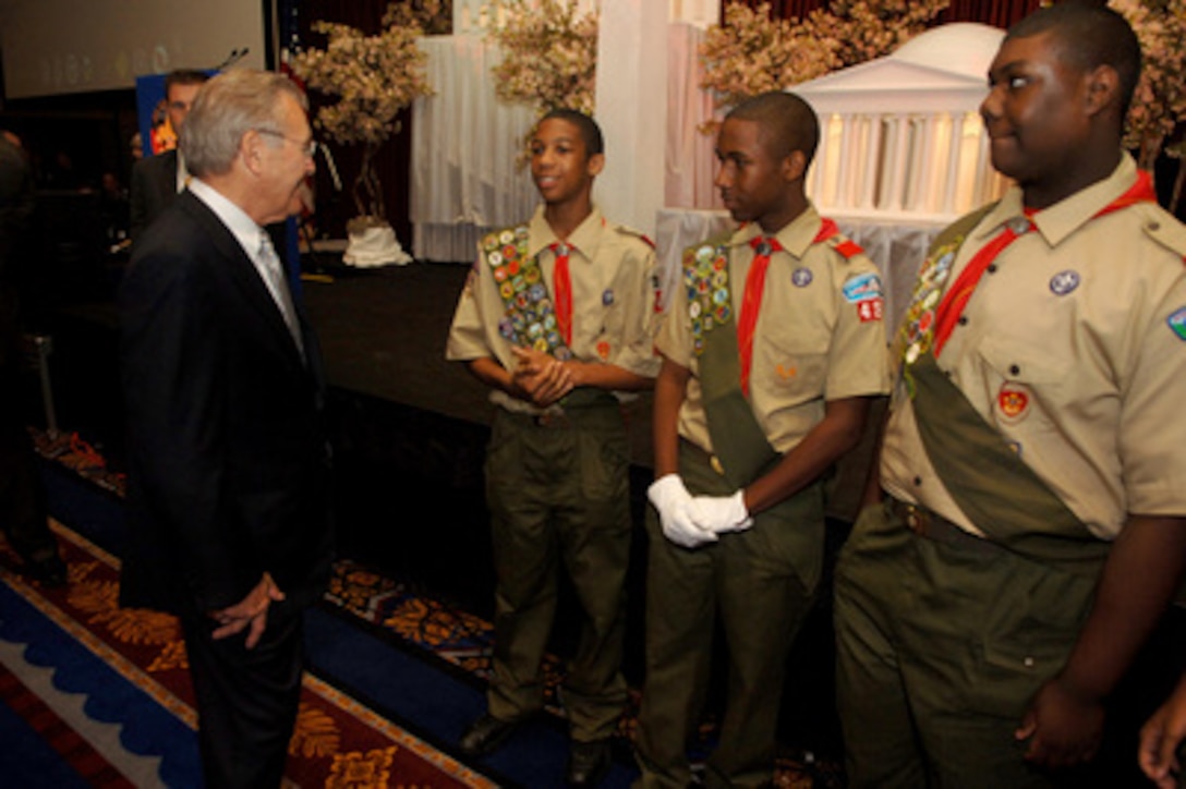 Secretary of Defense Donald H. Rumsfeld speaks with Boy Scouts during the national annual meeting of the Boy Scouts of America at the Marriott Wardman Park in Washington, D.C. on May 25, 2006. Boy Scouts of America will present Rumsfeld with the Golden Buffalo Award. The award, scouting's highest commendation, was created in 1925 and is presented to those who give truly noteworthy and extraordinary service to youth. Rumsfeld will join previous honorees including Norman Rockwell, Charles Lindbergh, Bob Hope, Neil Armstrong and 14 former presidents including Gerald Ford. 