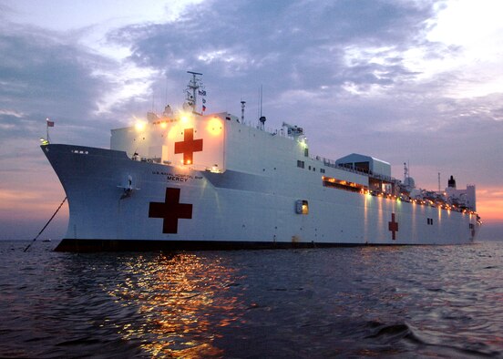 The U.S. Navy hospital ship USNS Mercy is anchored off the coast of Manila, the Philippines.  Three Airmen from the 374th Medical Group at Yokota Air Base, Japan, are deployed on the ship as it delivers aid and humanitarian assistance to Southeast Asia.  (U.S. Navy photo/Photographers Mate 2nd Class Troy Latham) 
