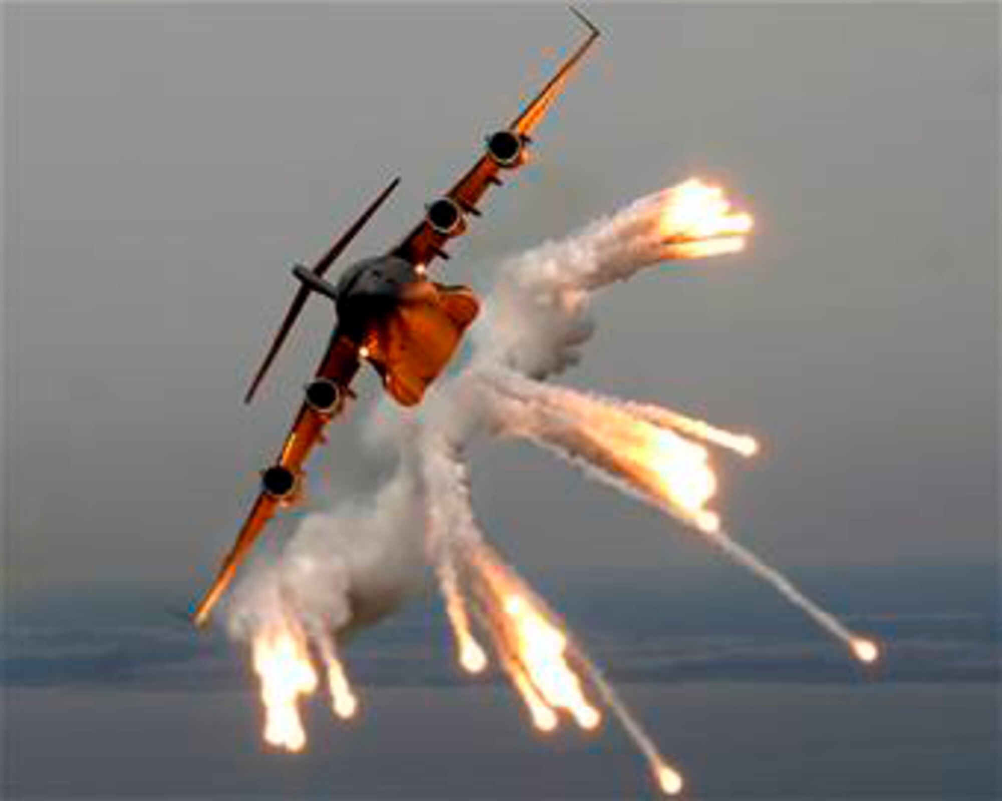 A C-17 from Charleston Air Force Base, S.C., releases flares over the Atlantic Ocean. The June 2 Travis event will give members an opportunity to see a sample of the C-17’s capability.  (U.S. Air Force photo by Tech. Sgt. Rusell Cooley)
