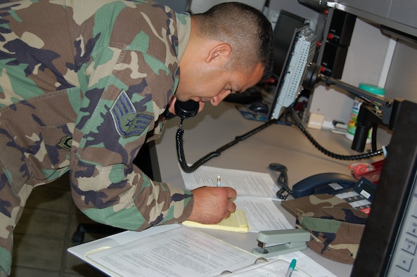 Staff. Sgt. Huizar gets hundreds of calls every day in the 433rd Airlift Wing Command Post. As a controller, it is his job to gather infortmation from several locations and make sure it gets to those who need it. (U.S. Air Force Photo by Maj. Elena Milford)