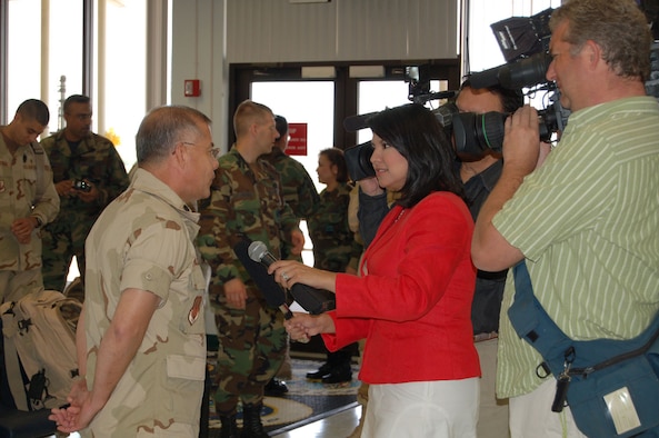 Lt. Col. Mario Pastrano, a Health Services Administrator with the 433rd Airlift Wing, took some time on deployment day to explain to local reporters what he and his people will be responsible for during thier deployment. The Reservists will operate the Casualty Aeormedical Staging Facility at Balad AB, Iraq. It will be thier primary responsability to get the wounded out of Iraq and on to Germany or the US for more definitive care. The CASF at Balad will be the last stop in country for most of those wounded in Iraq. (U.S. Air Force photo by Tech. Sgt. Collen McGee)