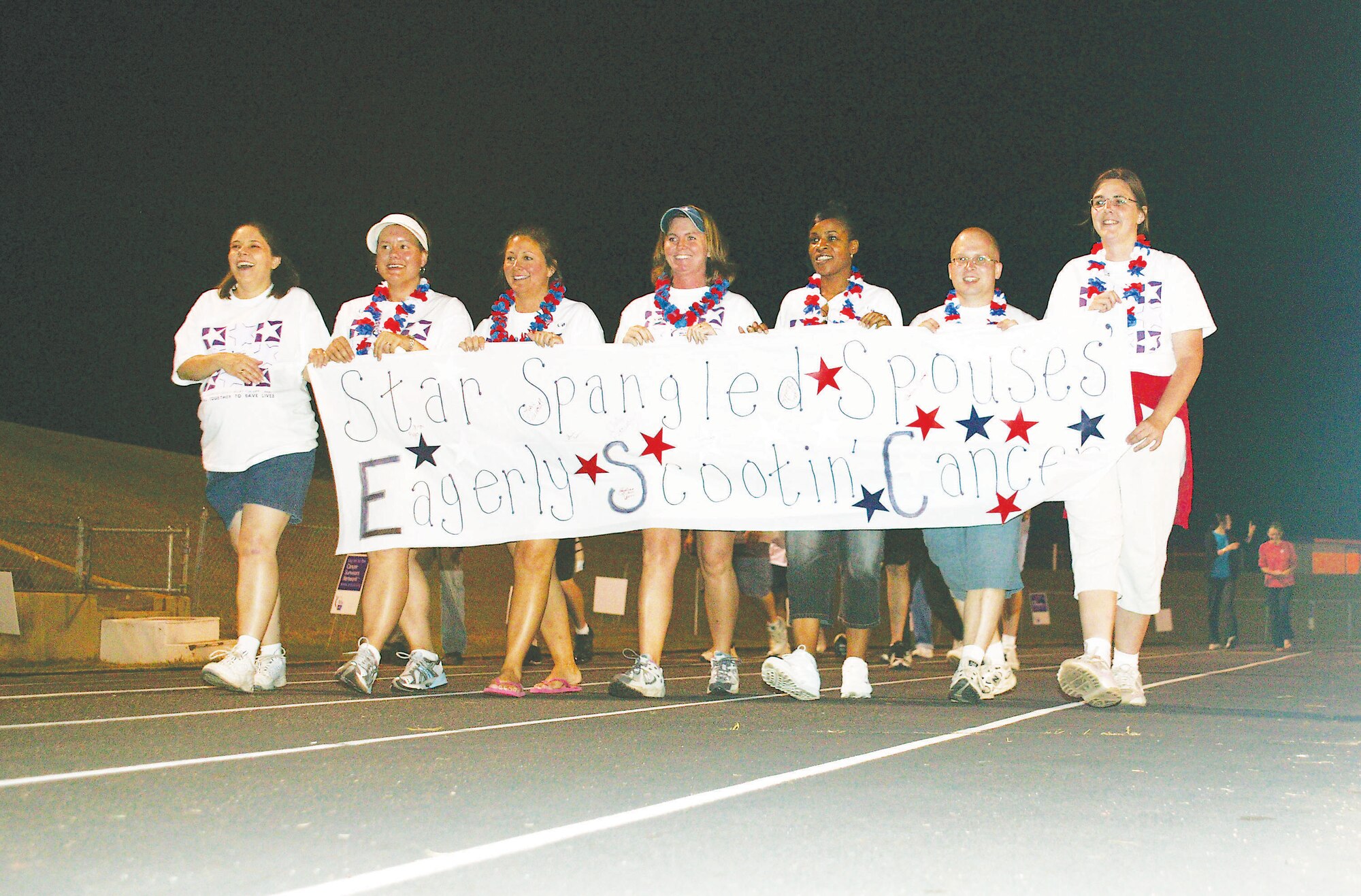 Members of Shaw's Enlisted Spouses Club participate in Replay for Life May 19 at Hillcrest Middle School in Sumter.  The group raised more than $1,600 toward the fight against cancer.  (U.S. Air Force Photo/Tech Sgt. Kevin Williams)