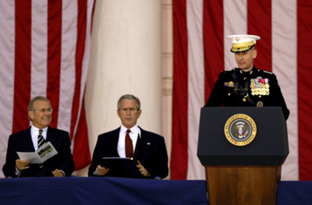 Chairman of the Joint Chiefs of Staff Gen. Peter Pace, U.S. Marine Corps, addresses the audience during the Memorial Day ceremony at Arlington National Cemetery on May 29, 2006. Pace joined Secretary of Defense Donald H. Rumsfeld and President George W. Bush in paying tribute to generations of Americans who have died while serving their country. 