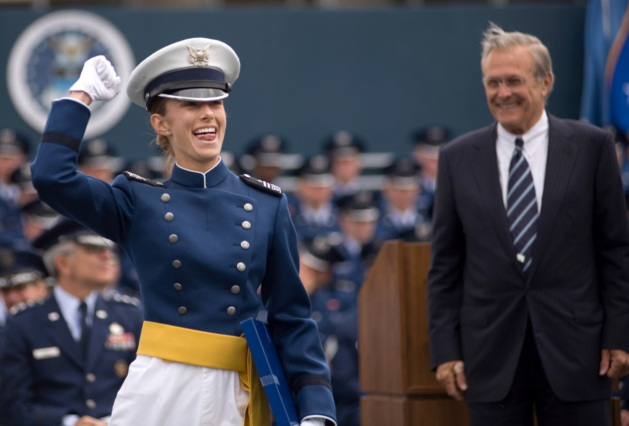 Second Lt. Liesl Shockley celebrates after receiving her diploma from Secretary of Defense Donald H. Rumsfeld at the U.S. Air Force Academy's 2006 graduation ceremony in Colorado Springs, Colo., on Wednesday, May 31, 2006. Lieutenant Shockley, a distinguished graduate, finished second in her class of 879 newly commissioned officers. (U.S. Air Force photo/Ken Wright)

