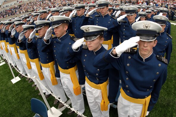 New lieutenants salute during the National Anthem at the opening of the U.S. Air Force Academy graduation ceremony in Colorado Springs, Colo., on Wednesday, May 31, 2006. The 879 graduates of the Class of 2006 incur a five-year active duty service commitment. Secretary of Defense Donald H. Rumsfeld was the guest speaker at the commencement. (U.S. Air Force photo/Joel Strayer)