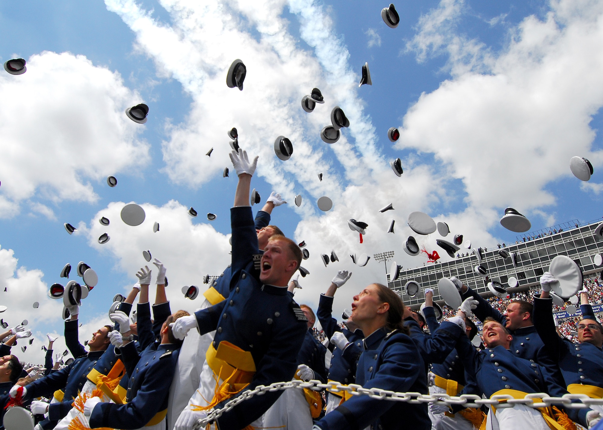 New lieutenants let their hats fly as they are dismissed from the U.S. Air Force Academy graduation ceremony in Colorado Springs, Colo., on Wednesday, May 31, 2006. The 879 graduates of the class of 2006 incur a five-year active duty service commitment. Secretary of Defense Donald H. Rumsfeld was the guest speaker at the commencement. (U.S. Air Force photo/Meggen Burghardt)
