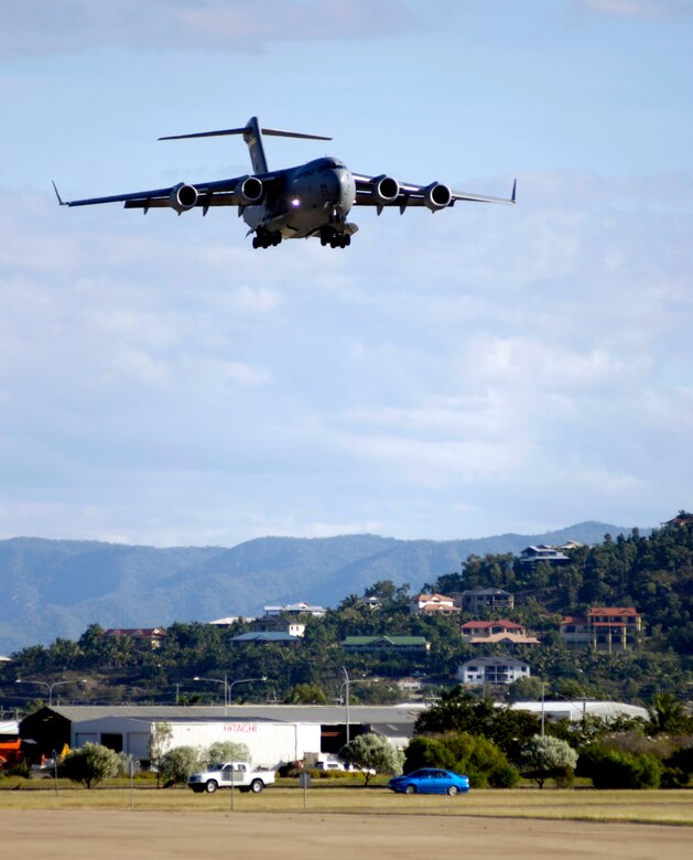 A C-17 Globemaster III comes in for a landing at Royal Australian Air Force Base Townsville, Australia, on Tuesday, May 30, 2006. Two C-17s from the 15th Airlift Wing and the Hawaii Air National Guard's 154th Wing at Hickam Air Force Base, Hawaii, are helping the Australian Defense Force reposition its forces in Australia to better support peace operations in East Timor. (U.S. Air Force photo/Tech. Sgt. Shane A. Cuomo) 
