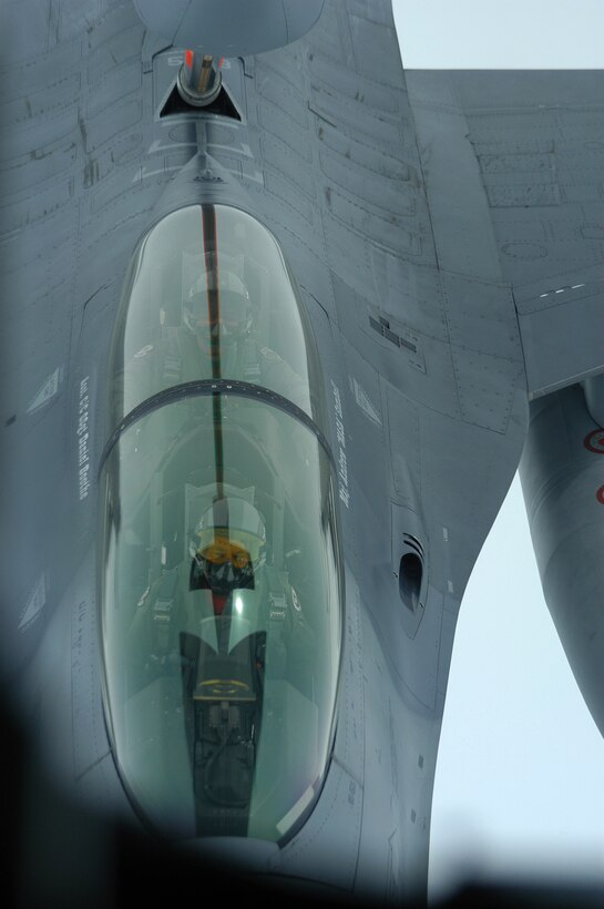 The 457th Fighter Squadron pilots in this F-16D+ can take in up to 1,200 pounds of fuel during a refueling mission such as this one. The 507th Aerial Refueling Wing from Tinker Air Force Base, Okla., assists in refueling missions with their KC-135s all over the world. (U.S. Air Force Photo/Tech. Sgt. Julie Briden-Garcia)