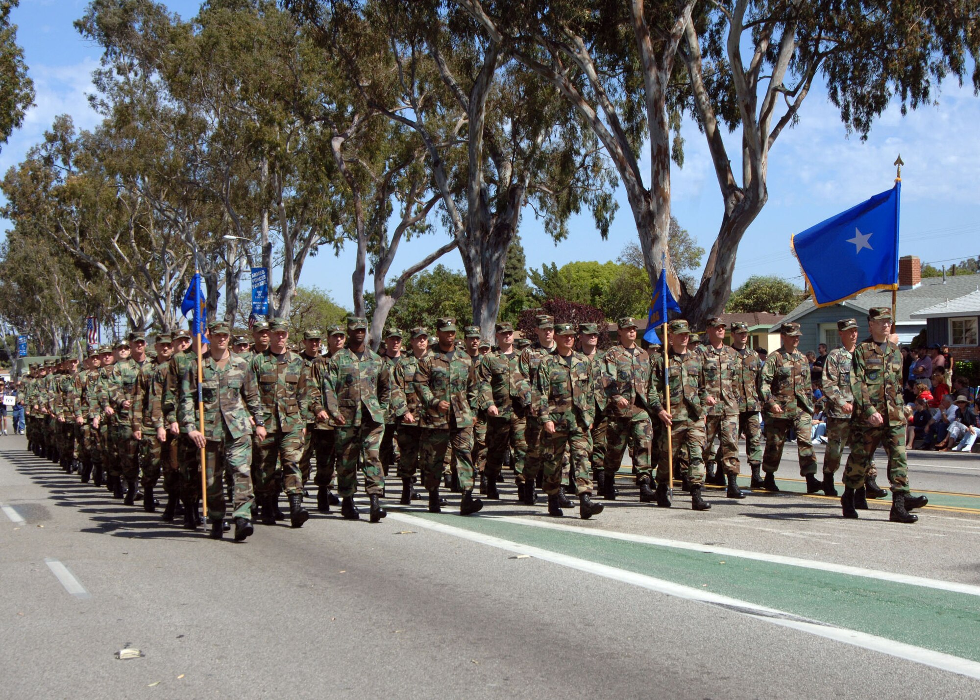 Brig. Gen. William McCasland leads the Los Angeles Air Force Base Marching Unit during the Torrance Armed Forces Day Parade. The DoD selected the City of Torrance, Calif. as one of the nationally-recognized regional sites to celebrate Armed Forces Day May 20, with dedicated military support. All five services were represented. (U.S. Air Force photo by Teri Mathis)