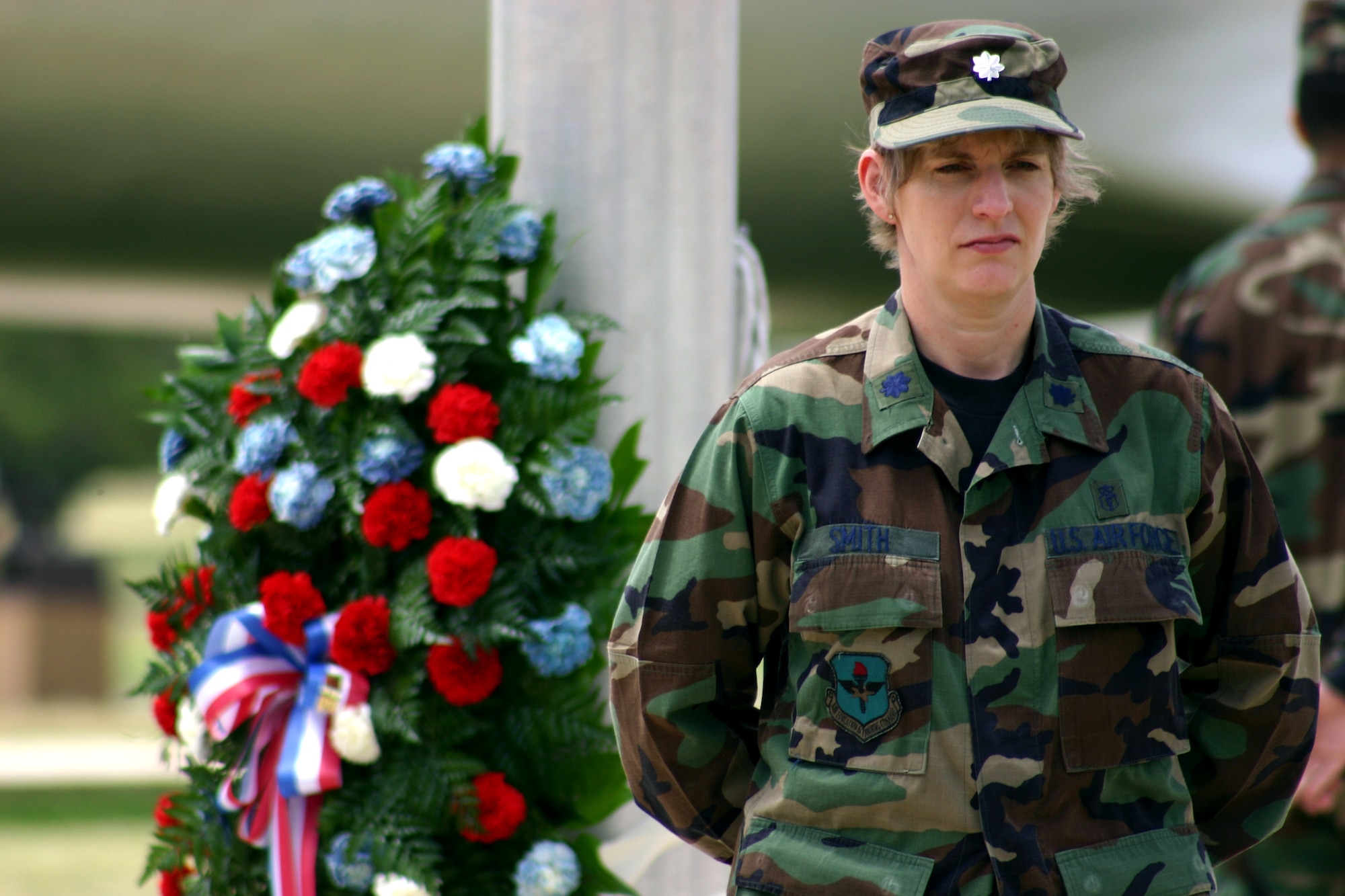 Lt. Col. Jeanne Smith stands at parade rest in silent vigil along with other members of the 59th Medical Wing's physical medicine flight at Lackland Air Force Base, Texas, on Friday, May 26, 2006. The vigil, part of the base's Memorial Day observances, honored the contributions of servicemembers who are, or were, missing in action or prisoners of war. Each shift stood vigil for 10 minutes during the eight-and-a-half-hour observance. (U.S. Air Force photo/Master Sgt. Kimberly Spencer) 
