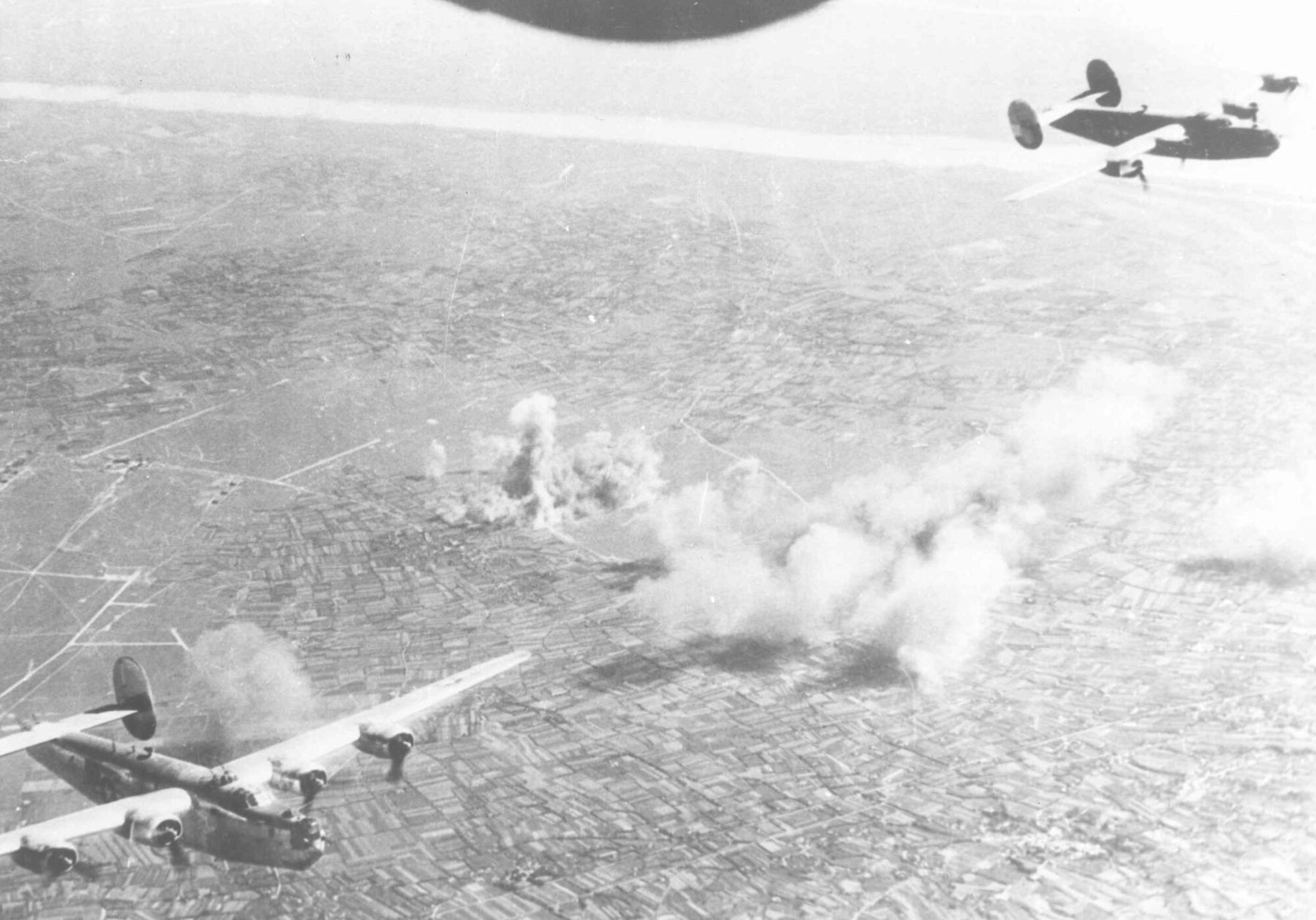 Consolidated B-24s after attacking an airfield in Italy. (U.S. Air Force photo)