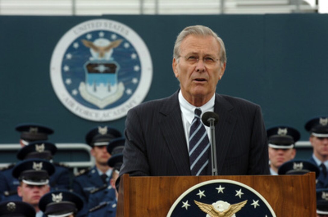 Secretary of Defense Donald H. Rumsfeld addresses the cadets in Falcon Stadium during the U.S. Air Force Academy's graduation ceremony for the class of 2006 in Colorado Springs, Colo., on May 31, 2006. Rumsfeld then shook hands with nearly 900 seniors as they received their diplomas. 
