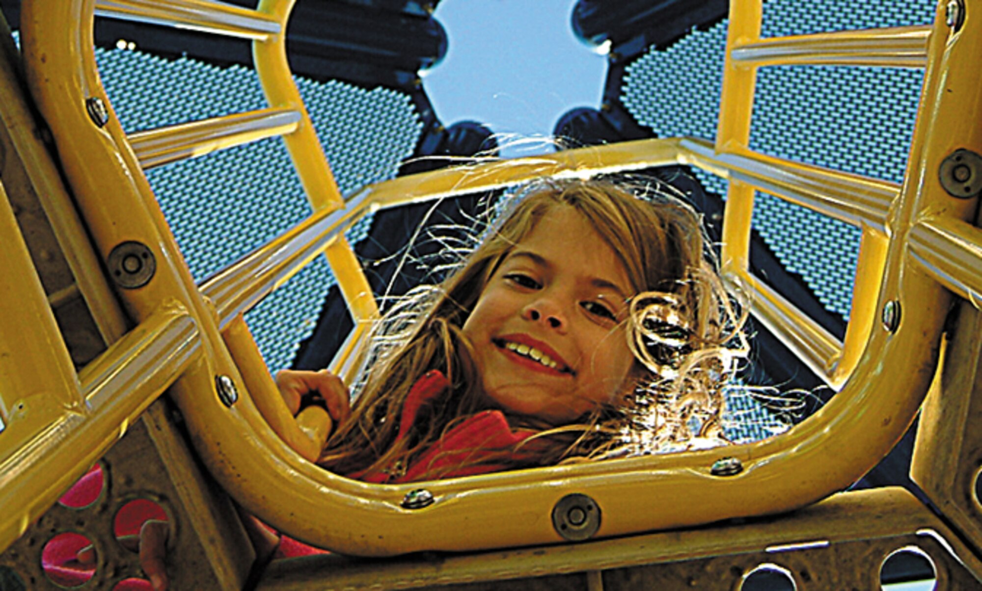 Children of 442nd Fighter Wing members took advantage of the agreeable weather, as well as Ike Skelton Park's playground equipment and other amenities, to work off the food provided at the Wing's annual Family Day picnic Oct. 14, 2006, at Whiteman Air Force Base, Mo.  (U.S. Air Force photo/Master Sgt. William Huntington)