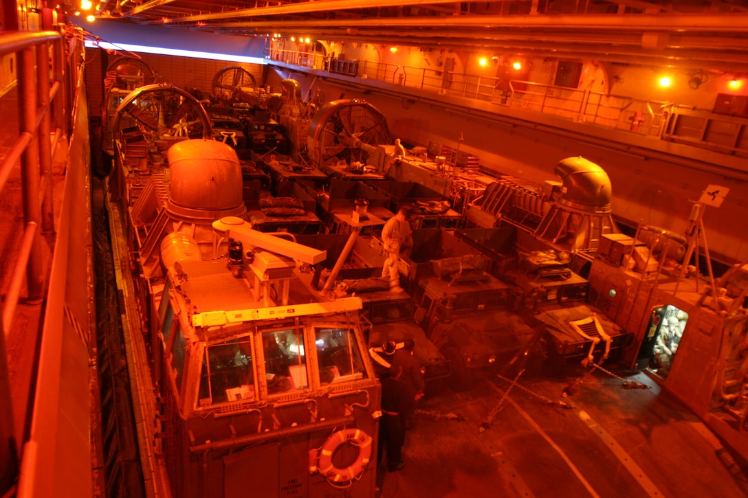 Marines of the 26th Marine Expeditionary Unit prepare to disembark from USS Bataan in order to construct a Logistics Supply Area to support land operations during the Composite Unit Training Exercise, Nov. 2, 2006.  (Official USMC photo by Lance Cpl. Aaron J. Rock)