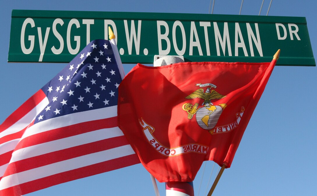 The GySgt. D.W. Boatman Drive sign stands tall along the winding roads of eastern North Carolina for its second year as it continues to bring honor and remembrance to the countries service members.  The town of North Topsail Beach honored Gunnery Sgt. Darrell W. Boatman by re-naming the road Marine Drive to GySgt. D.W. Boatman Drive during a memorial ceremony Dec. 7, 2005. The ceremony has become an annual event, being held at a various date each year, in remembrance of Boatman and other service members who have served their country.