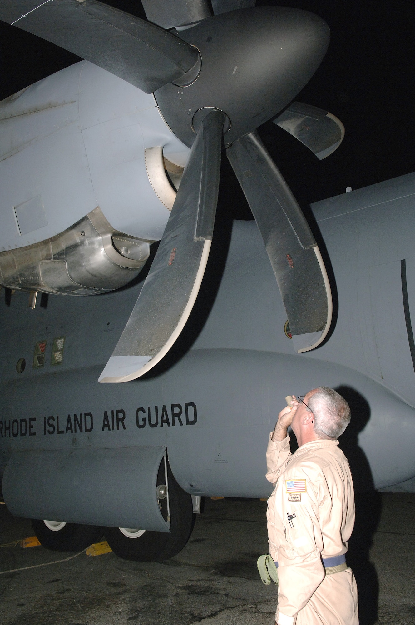 Technical Sgt. Randall Edwards, 746th Expeditionary Airlift Squadron, performs a preflight inspection on one of the Rhode Island Air National Guard's C-130J Hercules. (U.S. Air Force photo/Senior Airman Ricky Best) 


