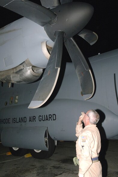 Technical Sgt. Randall Edwards, 746th Expeditionary Airlift Squadron, performs a preflight inspection on one of the Rhode Island Air National Guard's C-130J Hercules. (U.S. Air Force photo/Senior Airman Ricky Best) 