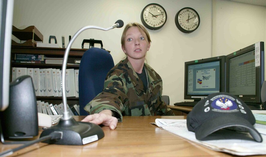 Staff Sgt. Amber Brown, 20th Maintenance Operations Squadron Maintenance Operations Center senior controller, communicates with crew chiefs via radio Oct. 16. (U.S. Air Force photo/Senior Airman John Gordinier)
