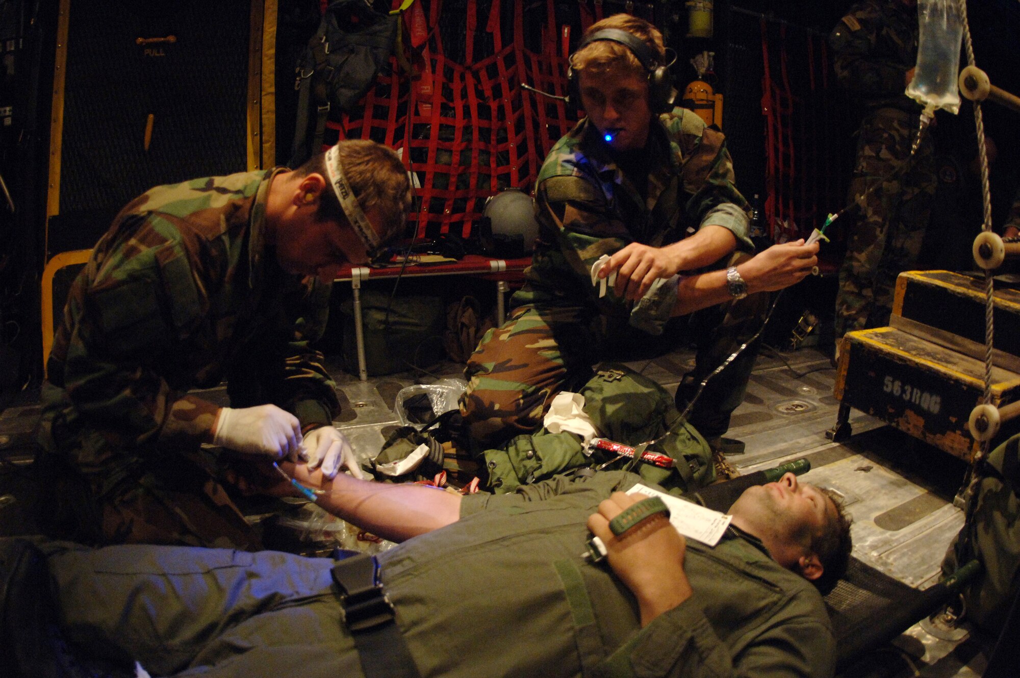 Pararescuemen provide medical assistance to Capt. Justin Williams on a night-rescue scenario during Exercise Atlantic Rescue at Avon Park Air Force Range, Fla., Nov. 1. Captain Williams role-played a leg injury during the scenario. He is an F-15E Strike Eagle weapons systems operator stationed at Langley Air Force Base, Va. (U.S. Air Force photo/Tech. Sgt. Larry A. Simmons) 



