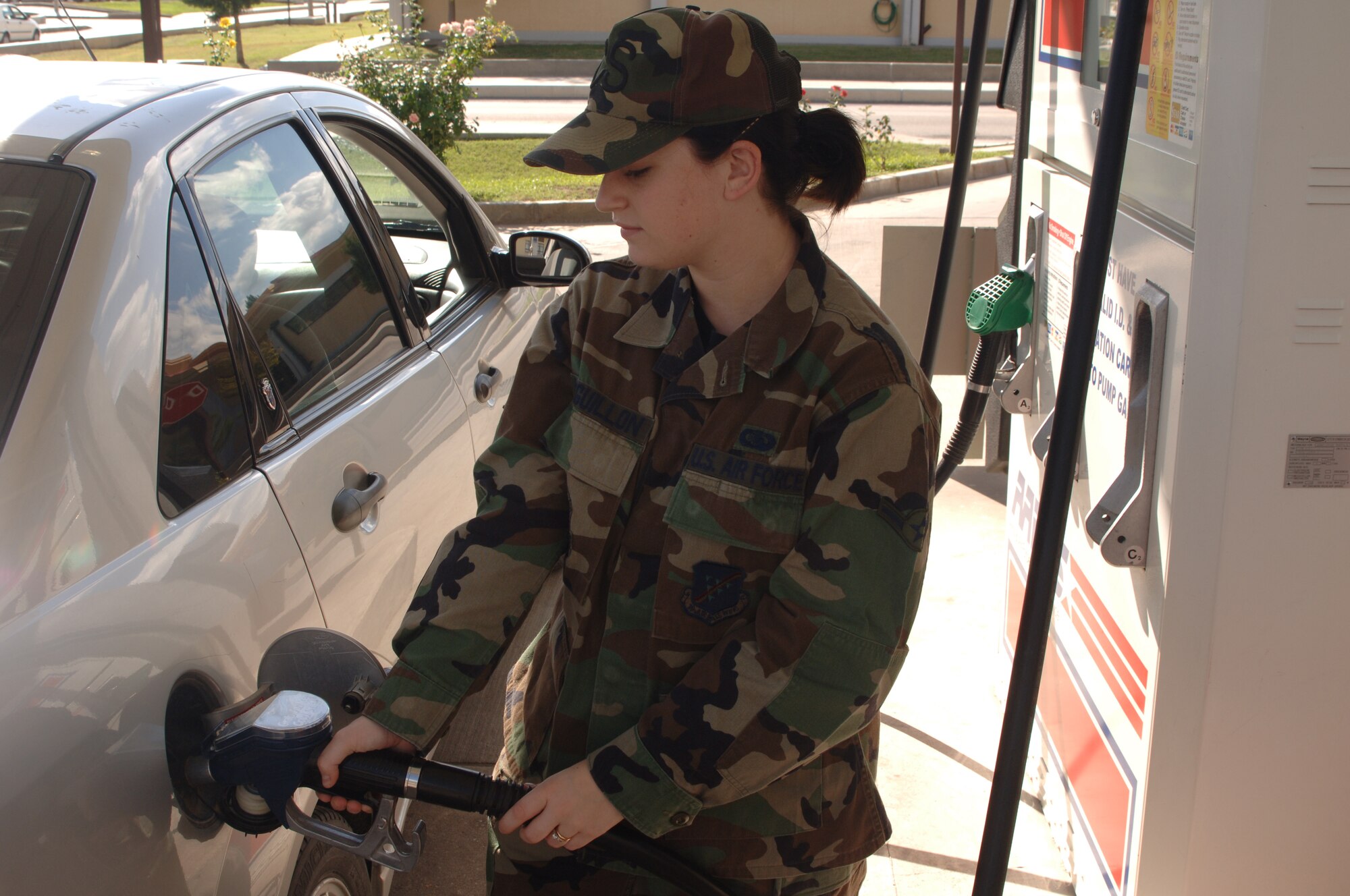Airman Kelly Leguillon, 39th Communications Squadron, fills her tank up at the Incirlik Shoppette Nov. 2. In the month of November gas prices around Europe are set to decrease an average of 23 cents. (U.S. AIr Force photo by Airman 1st Class Nathan Lipscomb)