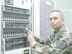 Staff Sgt. Jay Sablan, Air Force Weather Agency Communications Directorate, Network Systems Administrator, replaces a failed hard drive on the Air Force Weather Agency server. 