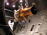 Workers prepare the TacSat-2 micro satellite for thermal vacuum testing at the Space Vehicles Directorate. (Air Force photo)