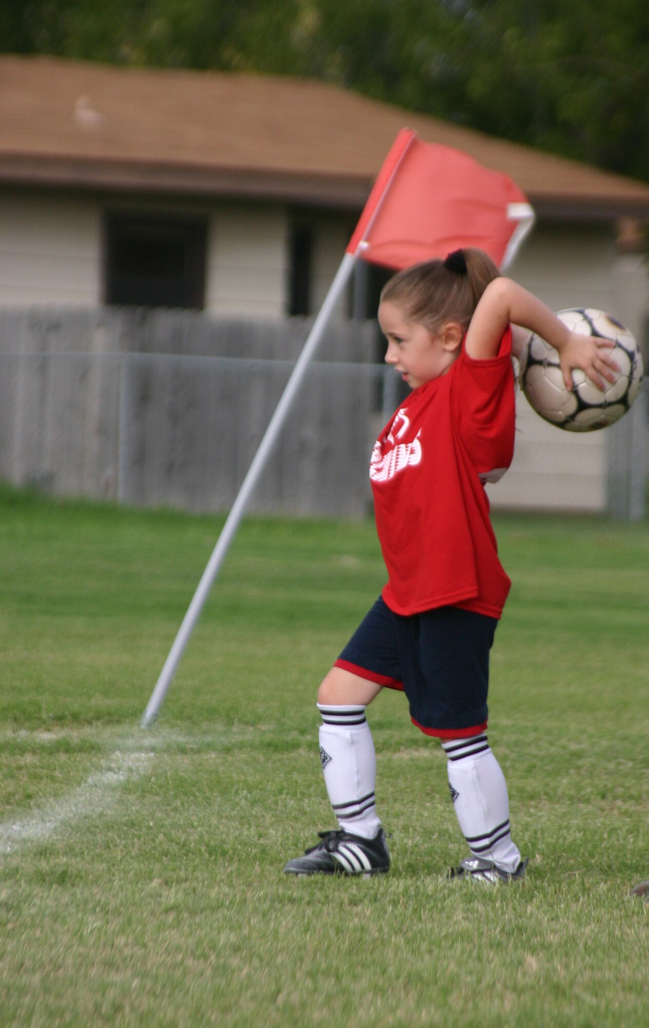 Bailey Wollington gets ready to throw the ball back into play for the Tigers in a youth soccer game Sept. 16. (U.S. Air Force photo/Airman Jacob Corbin)