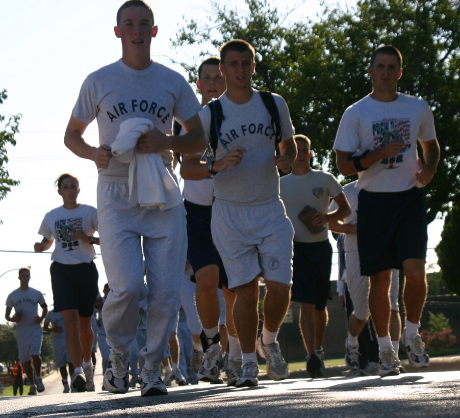 Members of the 362nd Training Squadron begin their morning run Wednesday on Fifth Avenue. Sheppard leads Air Education and Training Command in the percentage of personnel who have completed physical fitness training.