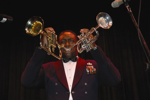 DOVER AIR FORCE BASE, Del. -- Master Sgt. Ken Trimmins, Air Force Reserve Band Full Spectrum non-commissioned officer in charge, performs at the Schwartz Center in Dover, as part of the 512th Airlift Wing Band Strike Package. Sergeant Trimmons was featured on the Jay Leno Show in 2002 for his unique ability to play two trumpets simultaneously. Three Reserve bands played at various venues in Dover from Oct. 19 - 21. (U.S. Air Force photo/Tech. Sgt. Veronica Aceveda)

