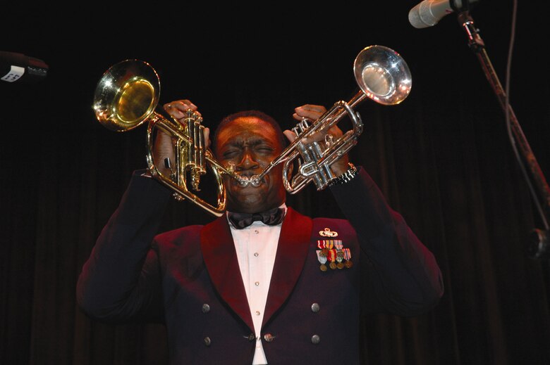 DOVER AIR FORCE BASE, Del. -- Master Sgt. Ken Trimmins, Air Force Reserve Band Full Spectrum non-commissioned officer in charge, performs at the Schwartz Center in Dover, as part of the 512th Airlift Wing Band Strike Package. Sergeant Trimmons was featured on the Jay Leno Show in 2002 for his unique ability to play two trumpets simultaneously. Three Reserve bands played at various venues in Dover from Oct. 19 - 21. (U.S. Air Force photo/Tech. Sgt. Veronica Aceveda)

