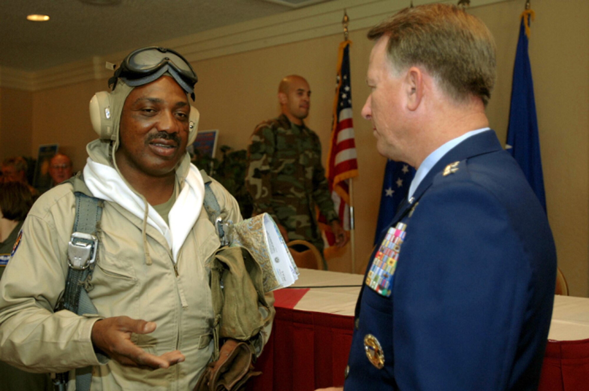 Master Sgt. Michael Varnado from the 94th Airlift Wing, Dobbins Air Reserve Base, Ga., chats with Lt. Gen. John A. Bradley, Air Force Reserve Command commander, during a break at the AFRC Human Resources Development Council workshop in Colorado Springs on Oct. 27, 2006. Sergeant Varnado was wearing a vintage uniform to support the workshop's theme, Remembering our Heritage. (U.S Air Force photo/Staff Sergeant Joselito Aribuabo).
