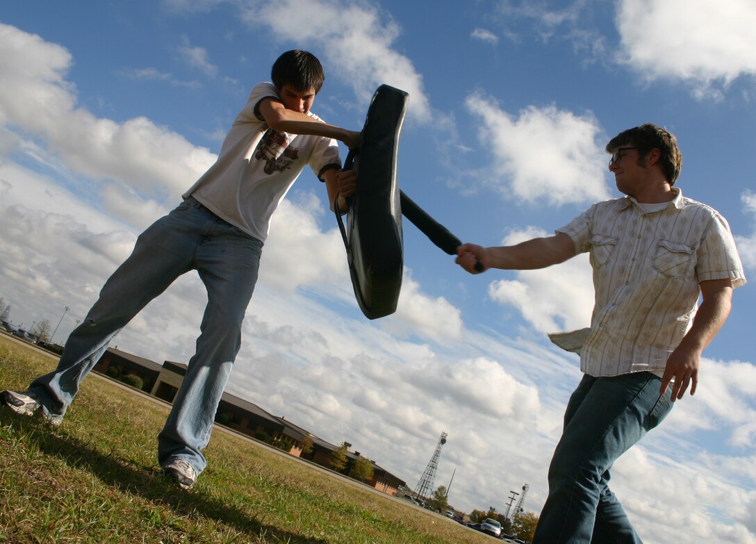 Burkburnett High School students like Steve Schutte, left, and Cody Burks spent a week with Sheppard personnel during the 8th Annual DREAM Week. Steve and Cody, who want to pursue a career in law enforcement, worked with security forces personnel. (U.S. Air Force photo/John Ingle)